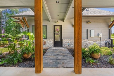 This stunning 2-story residence, nestled gracefully on the on Rayburn Country Club in Texas - for sale on GolfHomes.com, golf home, golf lot