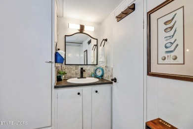 This lovely home on a one and a half lot provides ample privacy on Lake Tansi Village Country Club in Tennessee - for sale on GolfHomes.com, golf home, golf lot