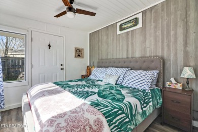 This lovely home on a one and a half lot provides ample privacy on Lake Tansi Village Country Club in Tennessee - for sale on GolfHomes.com, golf home, golf lot