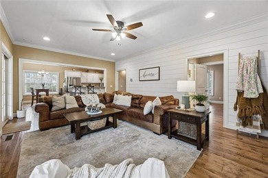 Immaculate and beautifully refreshed, this exceptional residence on The Golf Club At Sanctuary Cove in Georgia - for sale on GolfHomes.com, golf home, golf lot