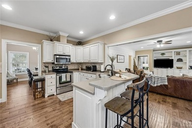 Immaculate and beautifully refreshed, this exceptional residence on The Golf Club At Sanctuary Cove in Georgia - for sale on GolfHomes.com, golf home, golf lot