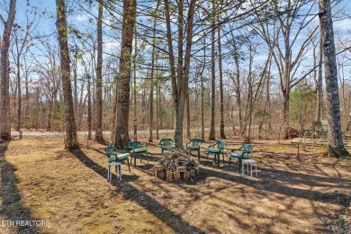 This lovely home on a one and a half lot provides ample privacy on Lake Tansi Village Country Club in Tennessee - for sale on GolfHomes.com, golf home, golf lot