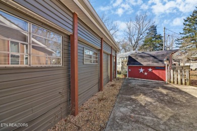 This lovely home on a one and a half lot provides ample privacy on Lake Tansi Village Country Club in Tennessee - for sale on GolfHomes.com, golf home, golf lot
