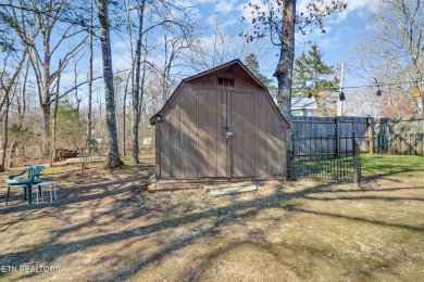 This lovely home on a one and a half lot provides ample privacy on Lake Tansi Village Country Club in Tennessee - for sale on GolfHomes.com, golf home, golf lot