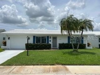 Desirable 55+ Community; Step inside to discover a warm and on Mainlands Golf Club in Florida - for sale on GolfHomes.com, golf home, golf lot