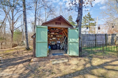 This lovely home on a one and a half lot provides ample privacy on Lake Tansi Village Country Club in Tennessee - for sale on GolfHomes.com, golf home, golf lot