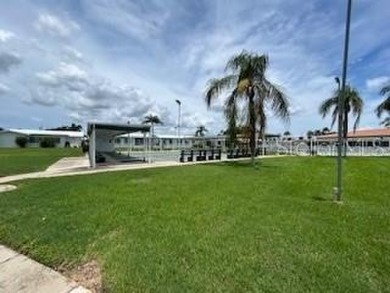 Desirable 55+ Community; Step inside to discover a warm and on Mainlands Golf Club in Florida - for sale on GolfHomes.com, golf home, golf lot