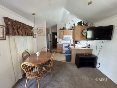 Great deal on a park model manufactured home in Beaver Dam on Beaver Dam Resort in Arizona - for sale on GolfHomes.com, golf home, golf lot