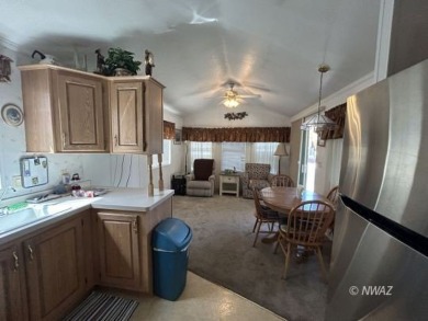 Great deal on a park model manufactured home in Beaver Dam on Beaver Dam Resort in Arizona - for sale on GolfHomes.com, golf home, golf lot