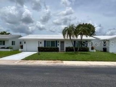 Desirable 55+ Community; Step inside to discover a warm and on Mainlands Golf Club in Florida - for sale on GolfHomes.com, golf home, golf lot