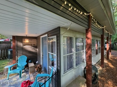 This lovely home on a one and a half lot provides ample privacy on Lake Tansi Village Country Club in Tennessee - for sale on GolfHomes.com, golf home, golf lot