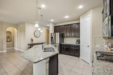 Welcome to 11948 Tranquil Cove, a beautifully designed home on Texas Star Golf Course in Texas - for sale on GolfHomes.com, golf home, golf lot