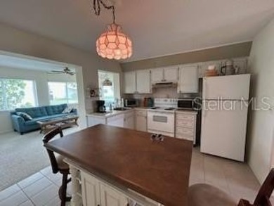Desirable 55+ Community; Step inside to discover a warm and on Mainlands Golf Club in Florida - for sale on GolfHomes.com, golf home, golf lot