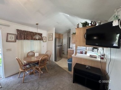 Great deal on a park model manufactured home in Beaver Dam on Beaver Dam Resort in Arizona - for sale on GolfHomes.com, golf home, golf lot