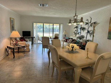 Lake and Golf views from this spacious, remodeled, 2nd floor on Boca Lago Golf and Country Club in Florida - for sale on GolfHomes.com, golf home, golf lot