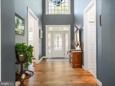 Welcome to 15455 Championship Drive, a stunning and meticulously on Regency At Dominion Valley Country Club in Virginia - for sale on GolfHomes.com, golf home, golf lot