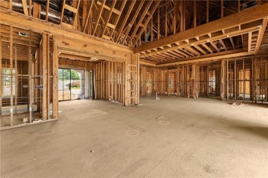 Discover refined luxury in this impeccably designed ranch estate on Manor Golf and Country Club in Georgia - for sale on GolfHomes.com, golf home, golf lot