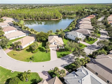 A MUST SEE!!! Magnificent lake and forest view in this updated on Shadow Wood Country Club in Florida - for sale on GolfHomes.com, golf home, golf lot