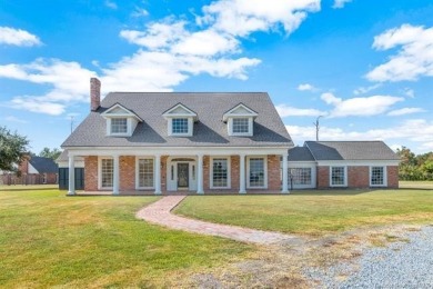 Timeless Colonial-Style Estate on 5 Acres
Step into elegance on  in Louisiana - for sale on GolfHomes.com, golf home, golf lot