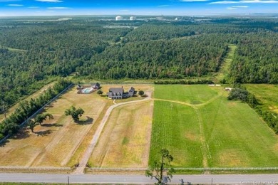 Timeless Colonial-Style Estate on 5 Acres
Step into elegance on  in Louisiana - for sale on GolfHomes.com, golf home, golf lot