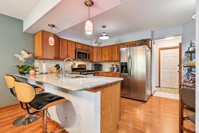 Welcome to this lovely property in a golf course community! It on Poplar Creek Country Club in Illinois - for sale on GolfHomes.com, golf home, golf lot