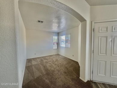 New year, new home! Step into this bright and welcoming home on Fred Enke Golf Course in Arizona - for sale on GolfHomes.com, golf home, golf lot