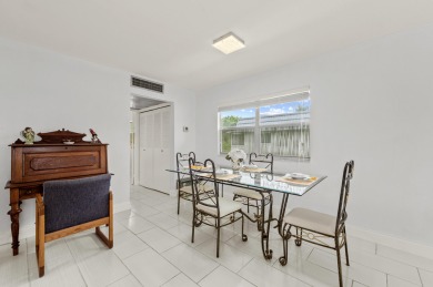 Enjoy lush garden and golf course views from this inviting on Kings Point Golf - Executive in Florida - for sale on GolfHomes.com, golf home, golf lot