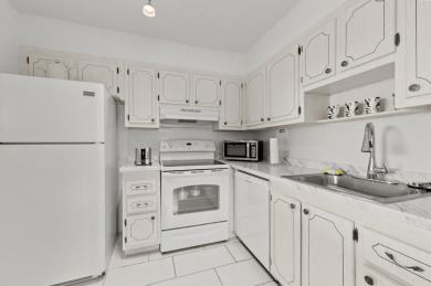Enjoy lush garden and golf course views from this inviting on Kings Point Golf - Executive in Florida - for sale on GolfHomes.com, golf home, golf lot