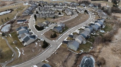 This stunning 4-bedroom, 3-bath custom-built home by Johnson on Boulder Pointe Golf Club in Minnesota - for sale on GolfHomes.com, golf home, golf lot