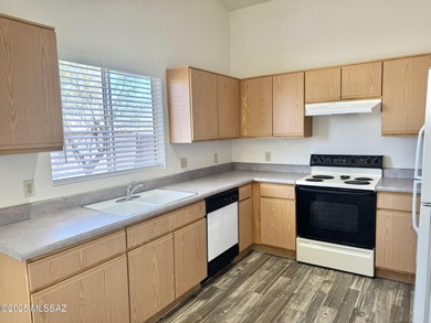 New year, new home! Step into this bright and welcoming home on Fred Enke Golf Course in Arizona - for sale on GolfHomes.com, golf home, golf lot