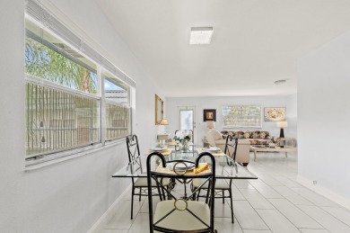 Enjoy lush garden and golf course views from this inviting on Kings Point Golf - Executive in Florida - for sale on GolfHomes.com, golf home, golf lot