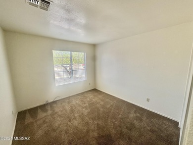 New year, new home! Step into this bright and welcoming home on Fred Enke Golf Course in Arizona - for sale on GolfHomes.com, golf home, golf lot