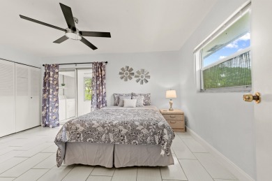 Enjoy lush garden and golf course views from this inviting on Kings Point Golf - Executive in Florida - for sale on GolfHomes.com, golf home, golf lot