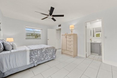 Enjoy lush garden and golf course views from this inviting on Kings Point Golf - Executive in Florida - for sale on GolfHomes.com, golf home, golf lot