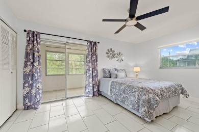 Enjoy lush garden and golf course views from this inviting on Kings Point Golf - Executive in Florida - for sale on GolfHomes.com, golf home, golf lot