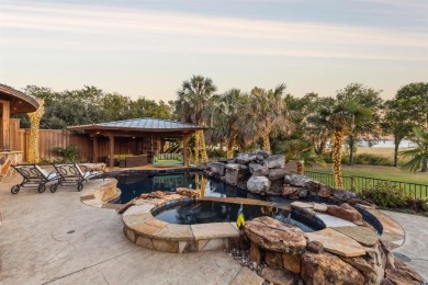 EXQUISITE WATERFRONT RESORT-STYLE LUXURY OASIS on the shores of on The Shores Country Club in Texas - for sale on GolfHomes.com, golf home, golf lot