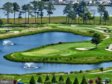 Welcome to this beautiful pond-front home, perfectly situated in on The Peninsula Golf and Country Club in Delaware - for sale on GolfHomes.com, golf home, golf lot