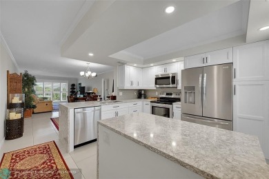 This spacious, beautifully renovated unit in Wynmoor (55 and on Wynmoor Golf Course in Florida - for sale on GolfHomes.com, golf home, golf lot
