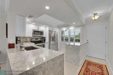 This spacious, beautifully renovated unit in Wynmoor (55 and on Wynmoor Golf Course in Florida - for sale on GolfHomes.com, golf home, golf lot