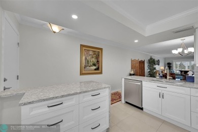 This spacious, beautifully renovated unit in Wynmoor (55 and on Wynmoor Golf Course in Florida - for sale on GolfHomes.com, golf home, golf lot