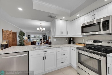 This spacious, beautifully renovated unit in Wynmoor (55 and on Wynmoor Golf Course in Florida - for sale on GolfHomes.com, golf home, golf lot