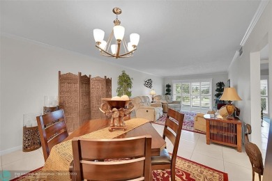 This spacious, beautifully renovated unit in Wynmoor (55 and on Wynmoor Golf Course in Florida - for sale on GolfHomes.com, golf home, golf lot