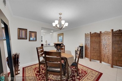 This spacious, beautifully renovated unit in Wynmoor (55 and on Wynmoor Golf Course in Florida - for sale on GolfHomes.com, golf home, golf lot