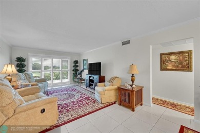 This spacious, beautifully renovated unit in Wynmoor (55 and on Wynmoor Golf Course in Florida - for sale on GolfHomes.com, golf home, golf lot