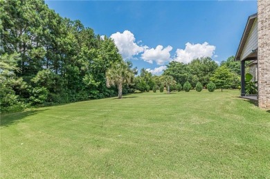 Welcome to 1405 Rainey Way - A Cul-de-Sac Gem in Crystal Lake on Crystal Lake Golf and Country Club in Georgia - for sale on GolfHomes.com, golf home, golf lot