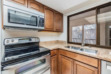 Welcome to this beautifully maintained 3-bedroom, 2-bathroom on Carrollwood Country Club in Florida - for sale on GolfHomes.com, golf home, golf lot