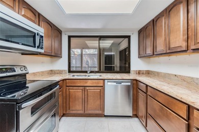 Welcome to this beautifully maintained 3-bedroom, 2-bathroom on Carrollwood Country Club in Florida - for sale on GolfHomes.com, golf home, golf lot