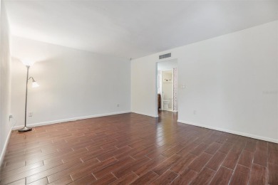 Welcome to this beautifully maintained 3-bedroom, 2-bathroom on Carrollwood Country Club in Florida - for sale on GolfHomes.com, golf home, golf lot