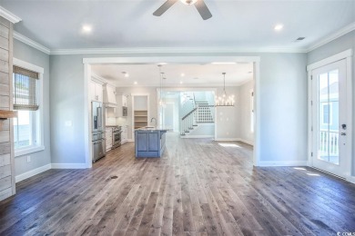 The Georgetown sits on Lot 49 in Living Dunes, a Grande Dunes on The Dunes Golf and Beach Club in South Carolina - for sale on GolfHomes.com, golf home, golf lot