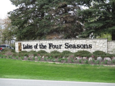 Updated 4 Bedroom, 2 Bath Tri-Level in Resort Style Community of on Lakes of the Four Seasons Country Club in Indiana - for sale on GolfHomes.com, golf home, golf lot